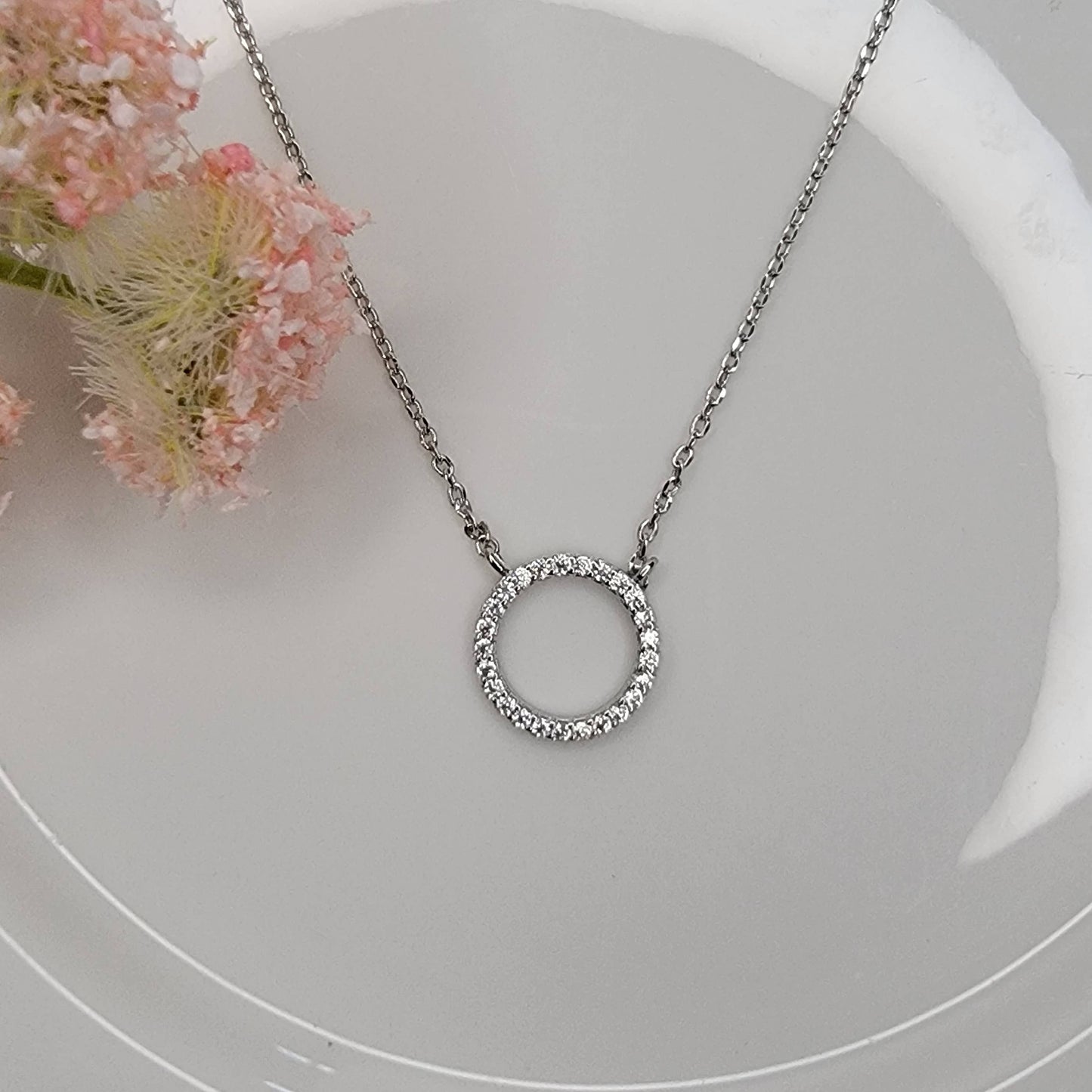 CIRCLE CZ PENDANT NECKLACE.