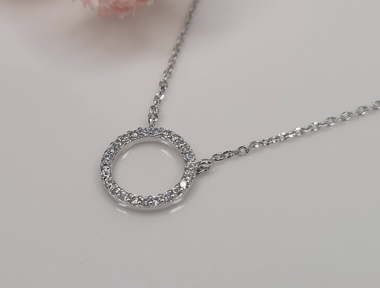 CIRCLE CZ PENDANT NECKLACE.