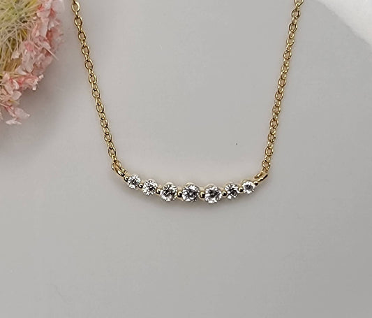 CZ SMALL CURVED BAR NECKLACE.